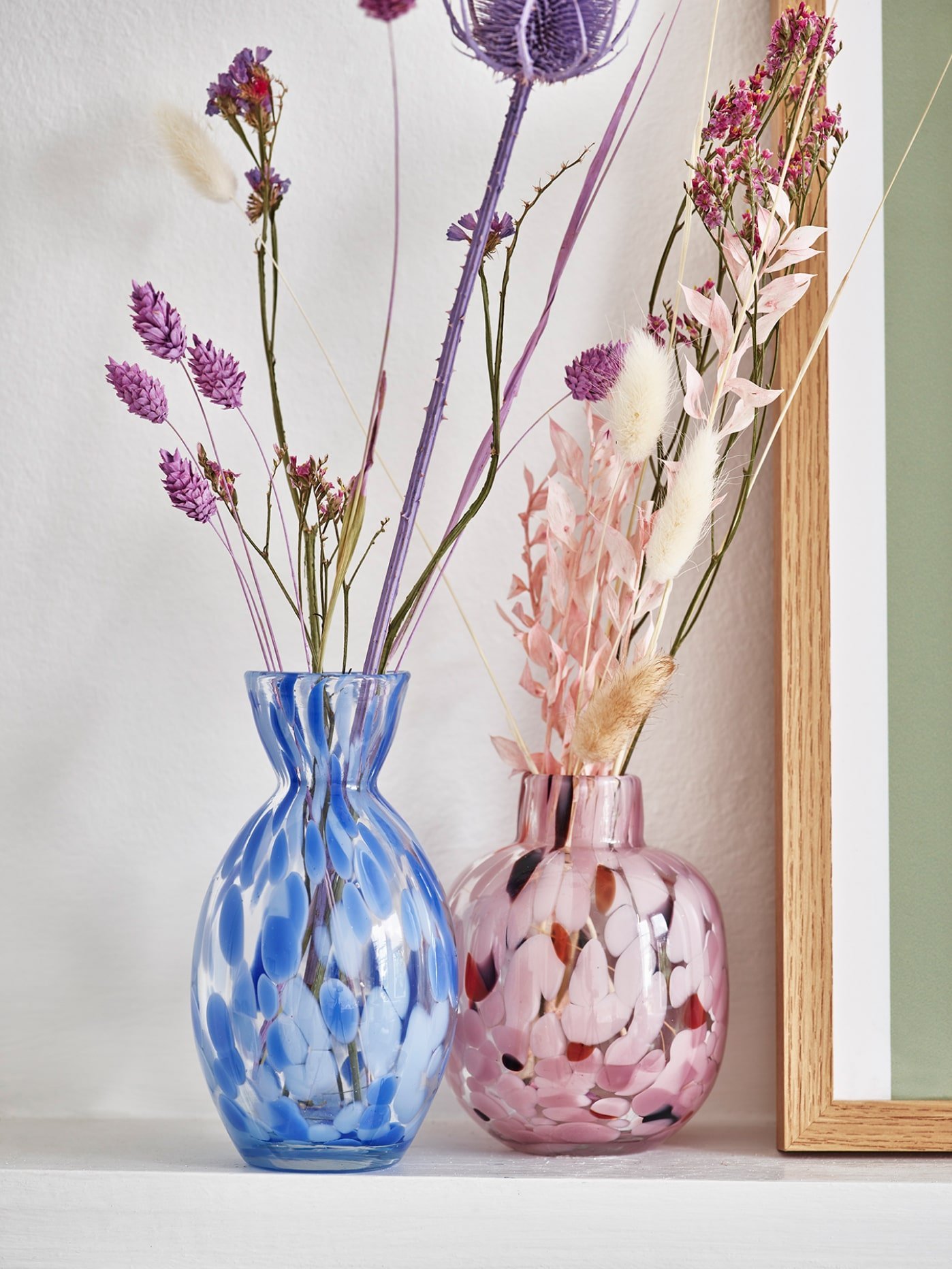 Two vases on a mantlepiece