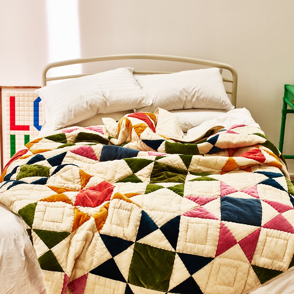Patchwork bedspread on a bed 