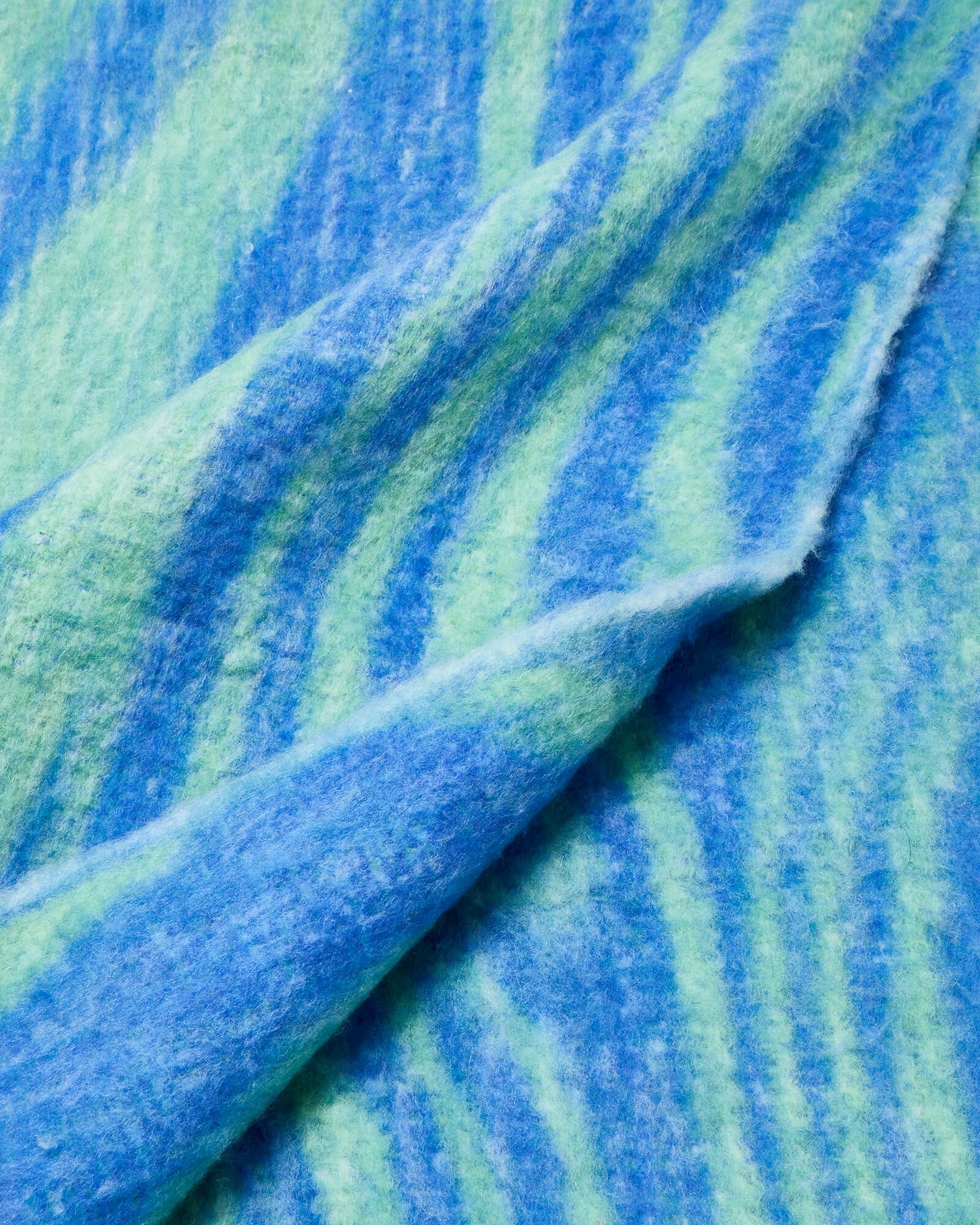 Solana Blue Swirl Fluffy Throw | Oliver Bonas Solana Blue Swirl Fluffy Throw | Oliver Bonas