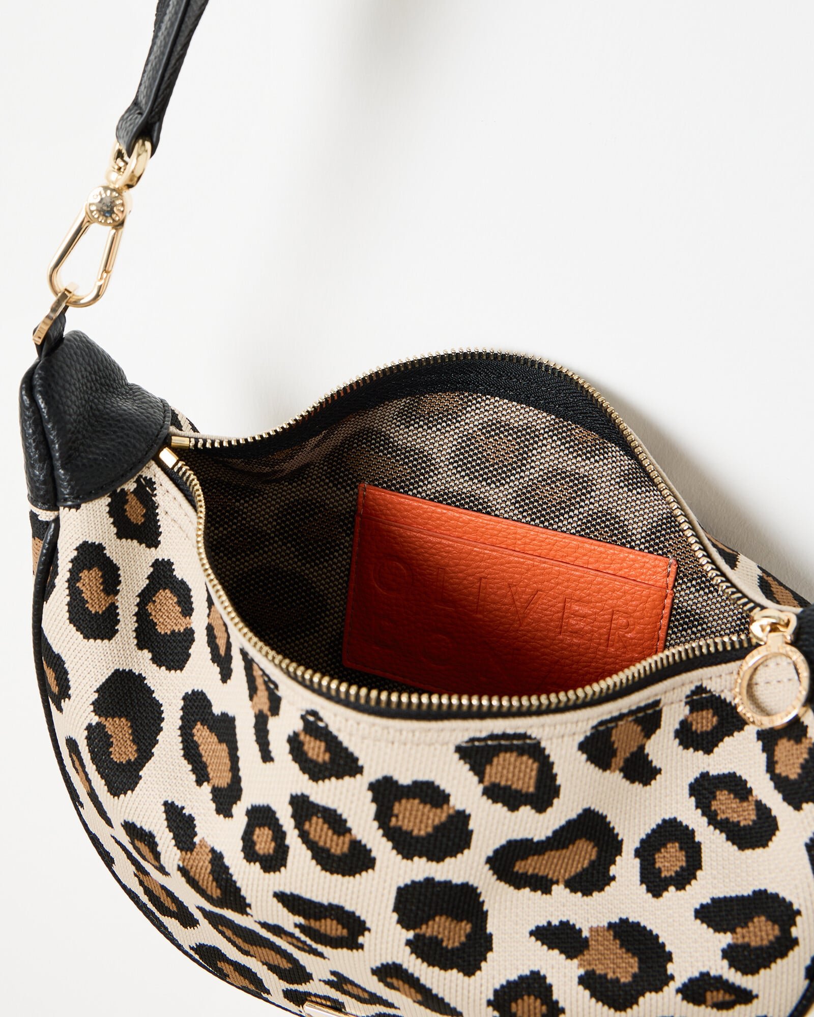 ダィニット HALF ROUND BELT BAG IN LEOPARD 【公式通販】