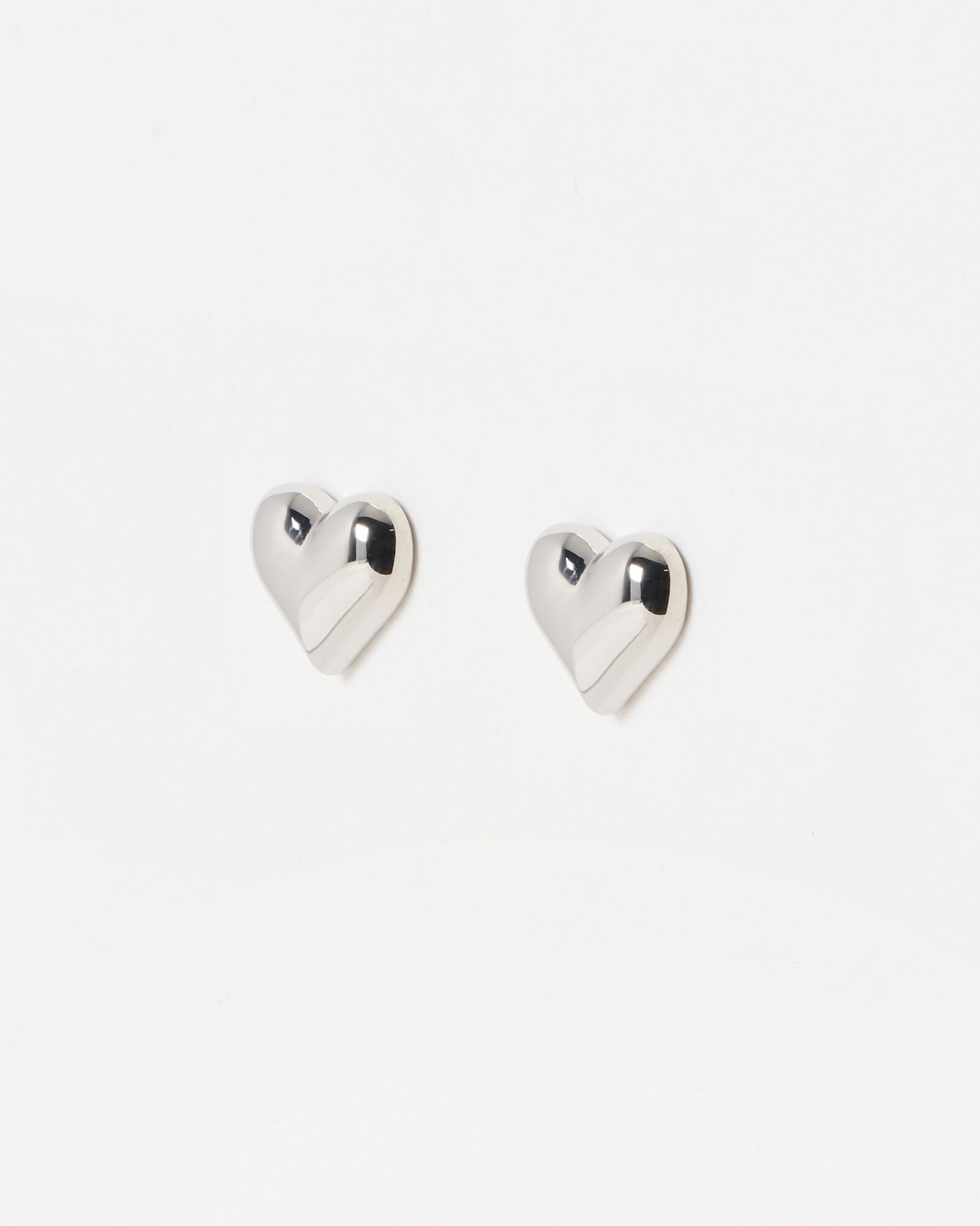 Cera Silver Tone Puffy Heart Earrings | Oliver Bonas