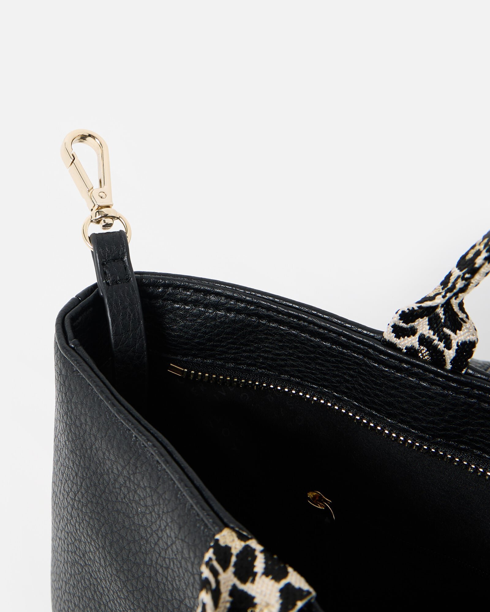 Jackie Black Leopard Print Strap Backpack | Oliver Bonas