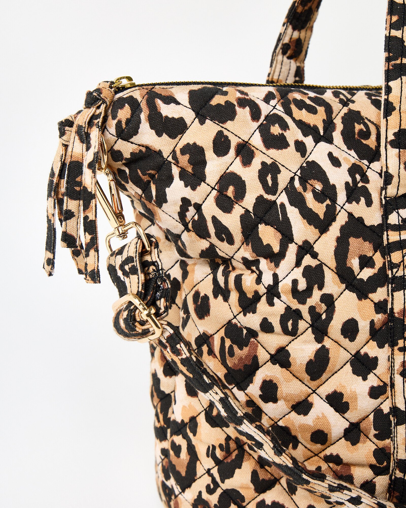 Becky Leopard Print Quilted Weekend Bag | Oliver Bonas