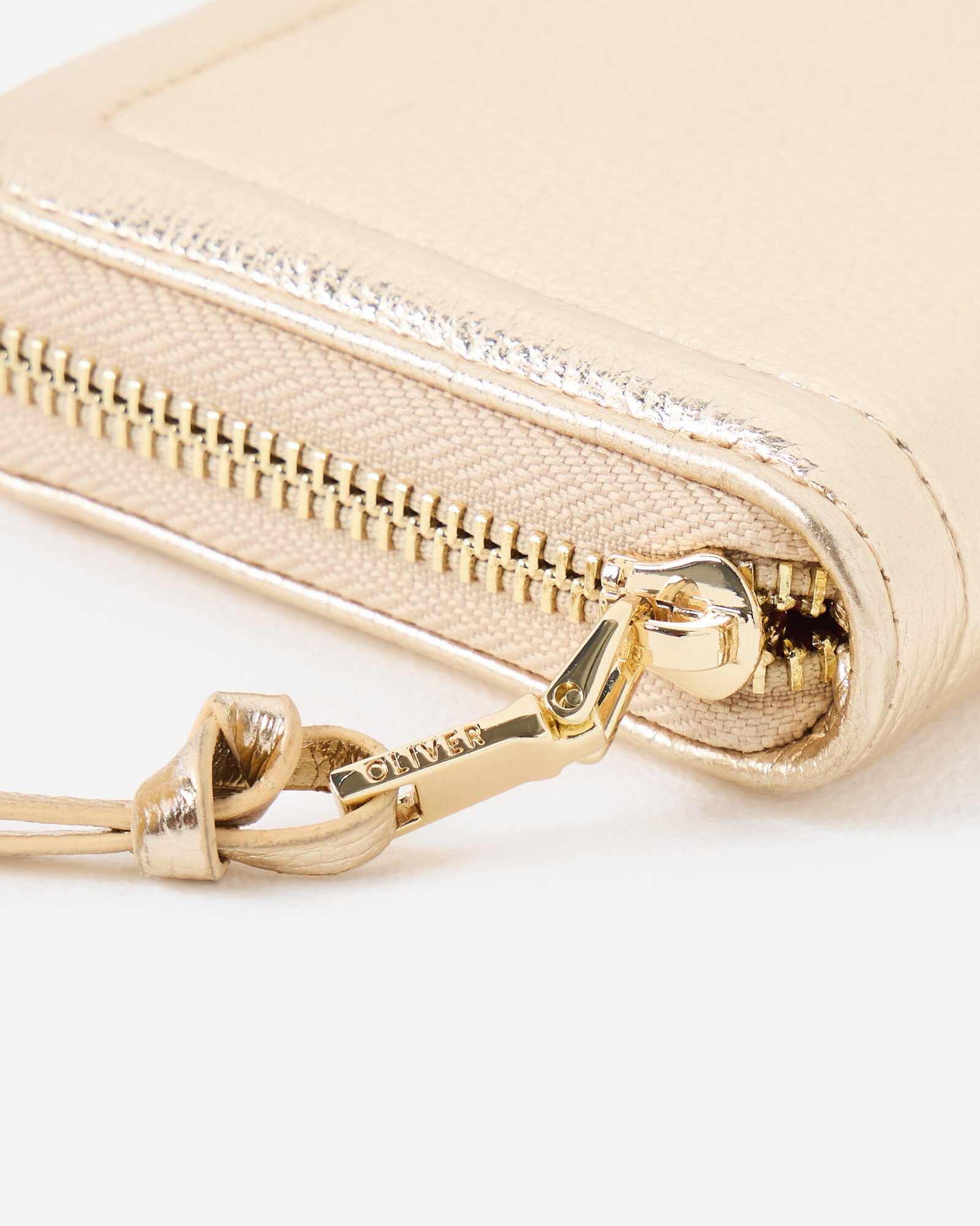 Maddie Gold Metallic Zip Around Purse | Oliver Bonas