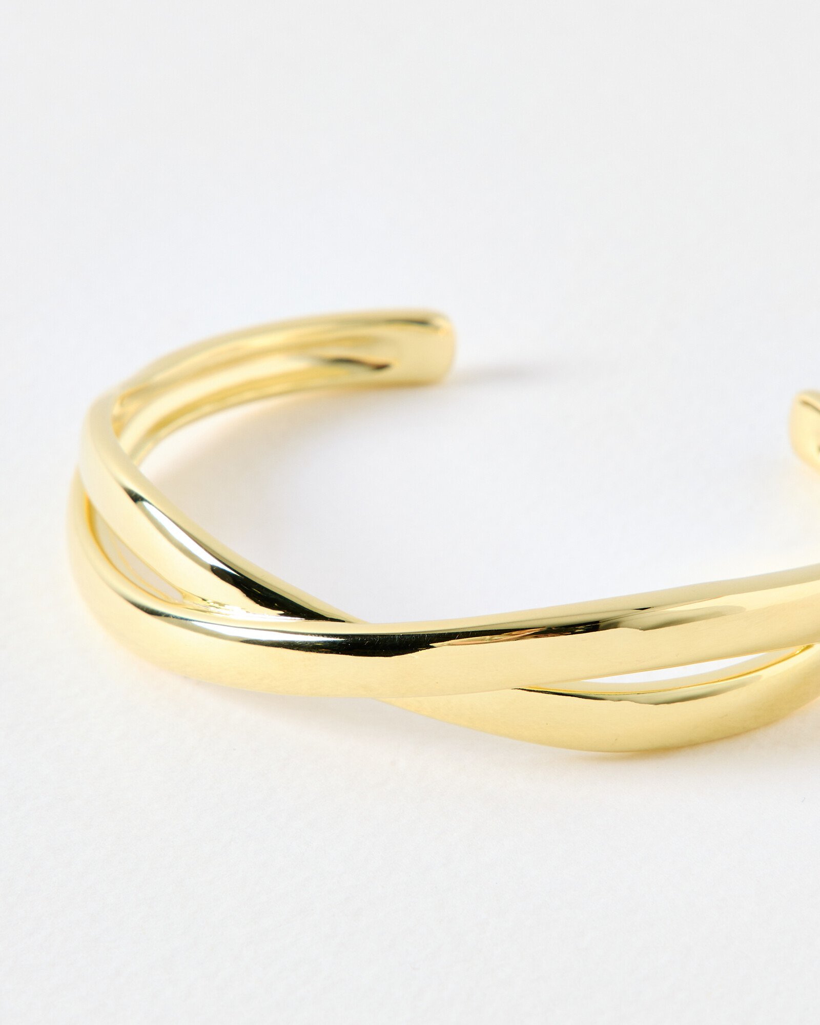 Petra Puffy Cross Over Gold Plated Cuff Bangle | Oliver Bonas