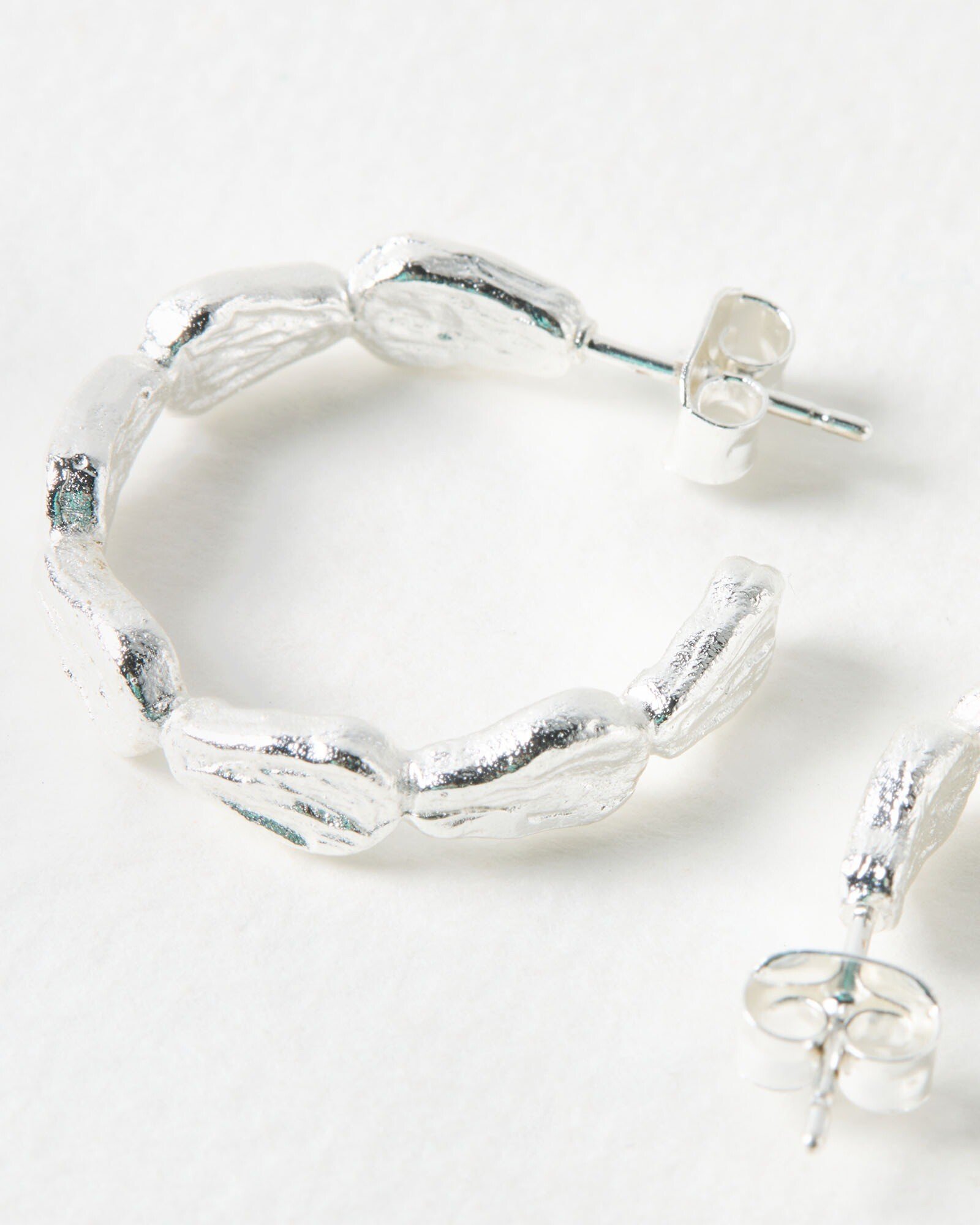 Talia Molten Shell Silver Plated Hoop Earrings | Oliver Bonas