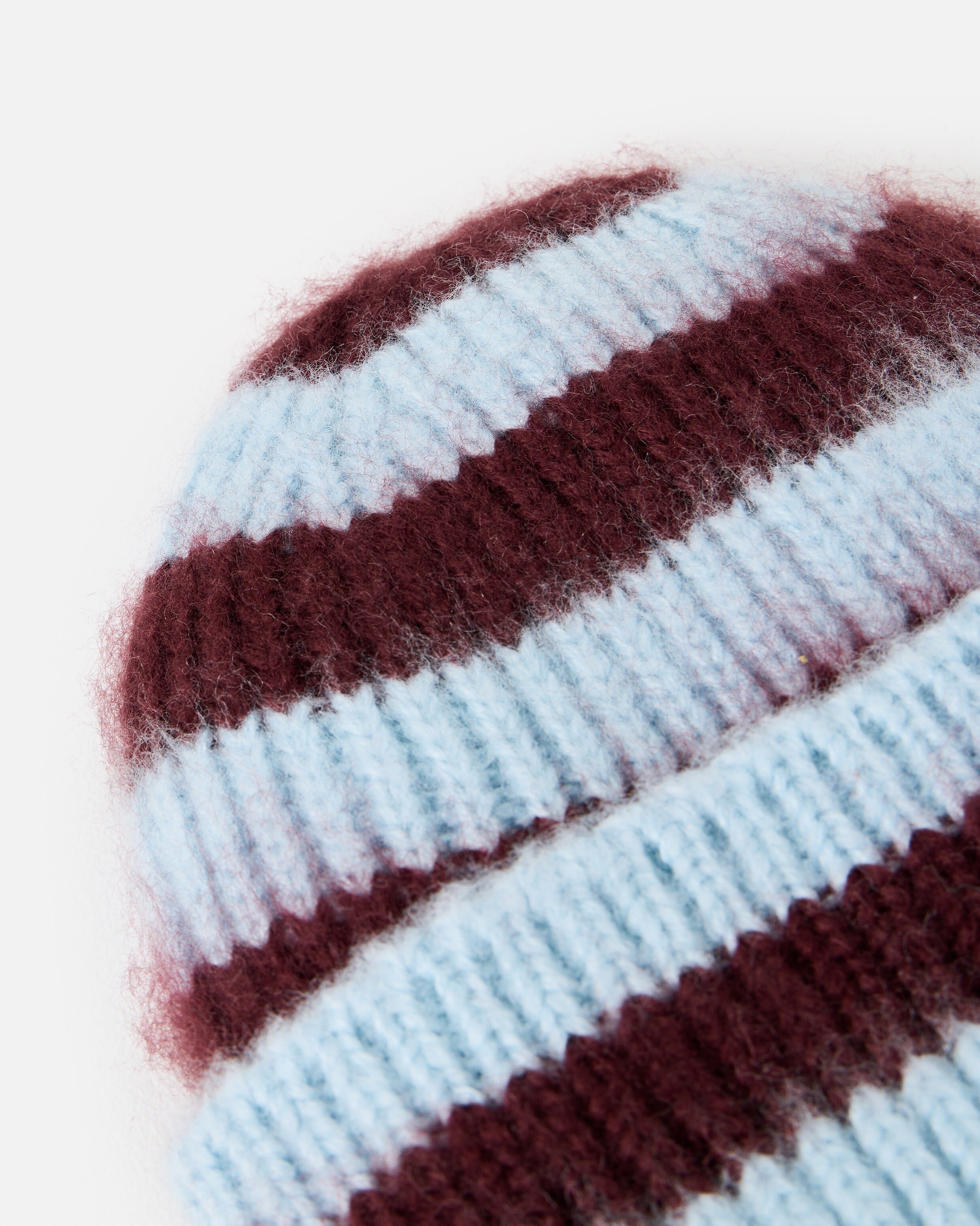 Blue & Burgundy Striped Fluffy Knitted Beanie Hat | Oliver Bonas