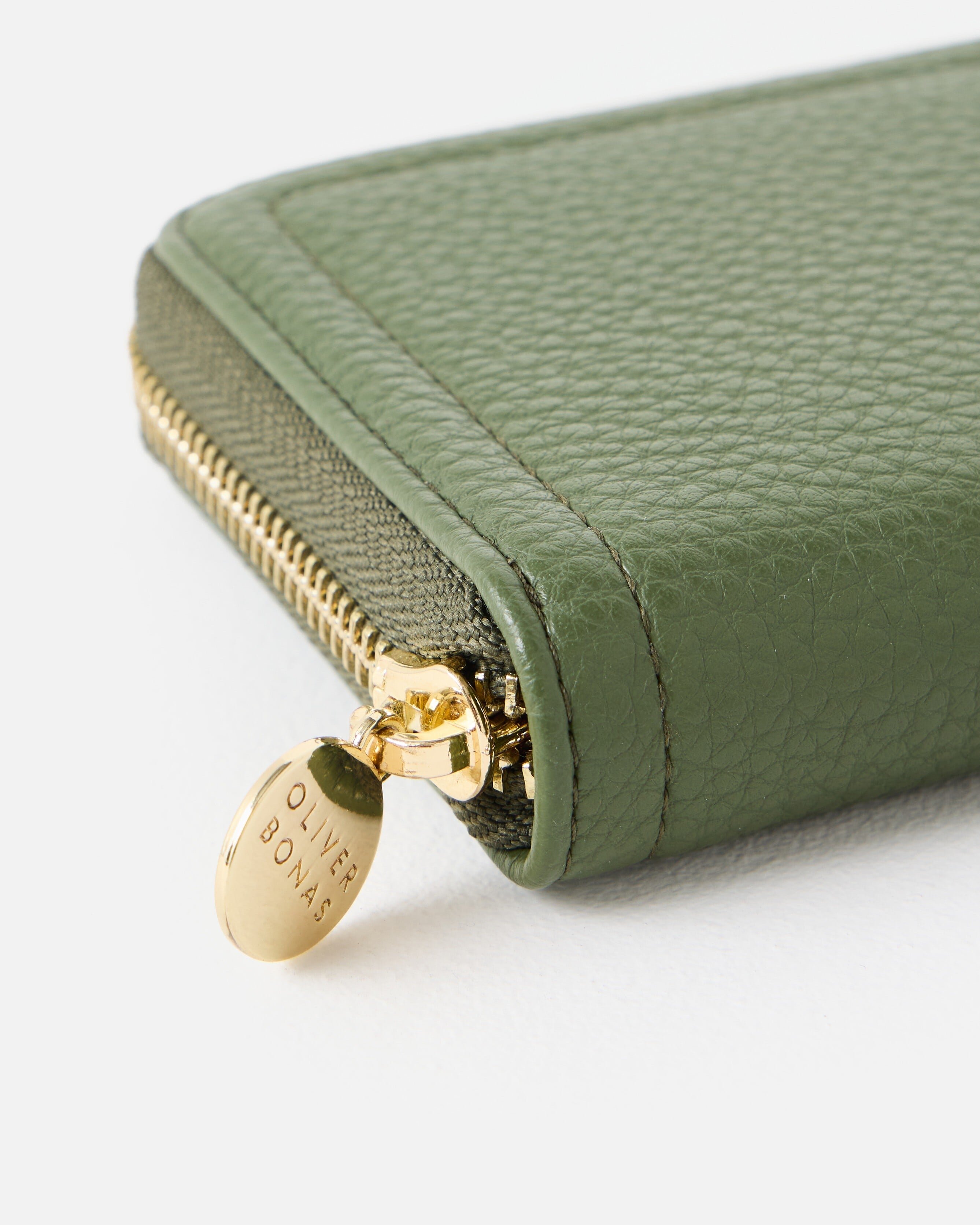 Maddie Khaki Green Zip Around Purse | Oliver Bonas
