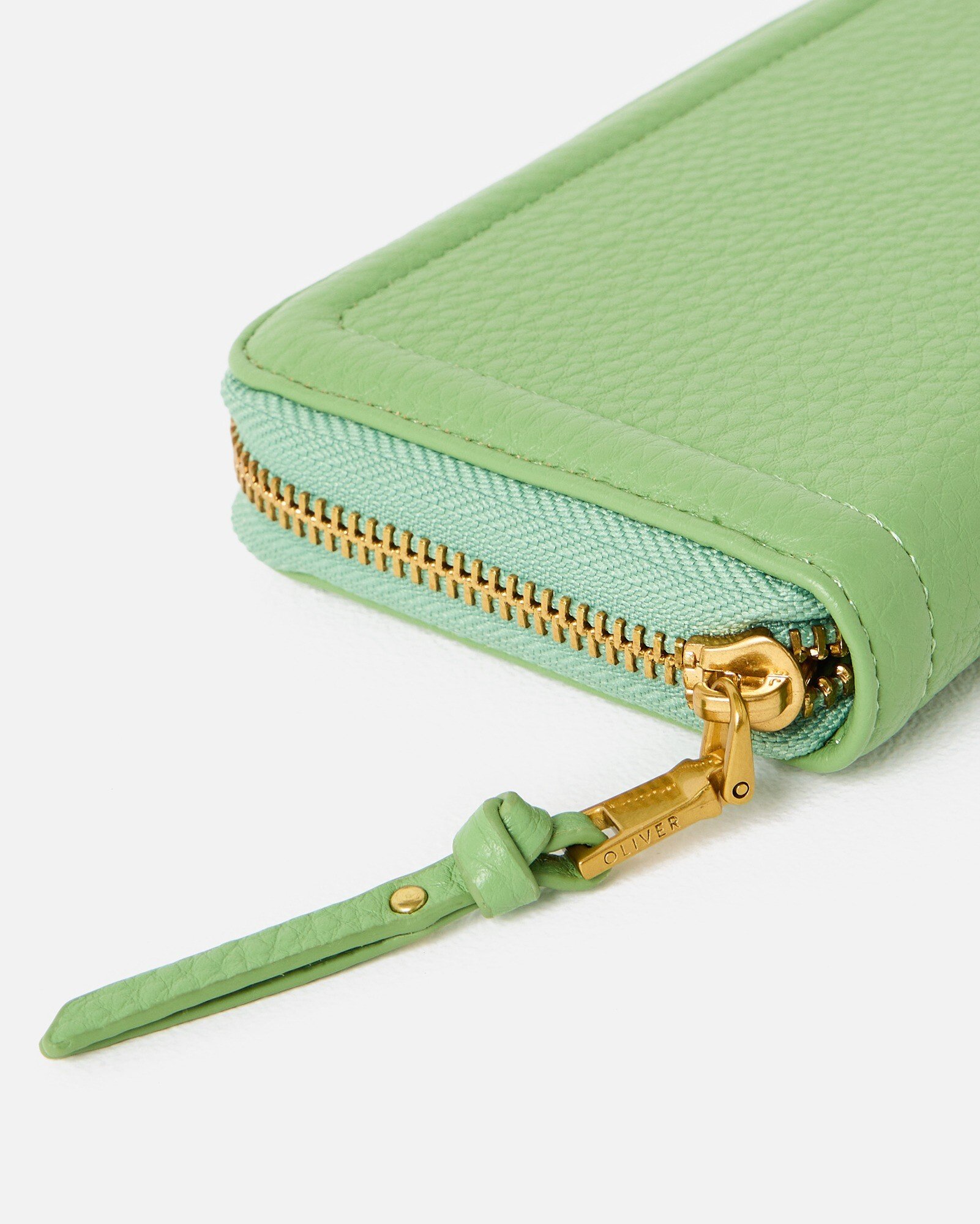 Maddie Green Zip Around Purse | Oliver Bonas