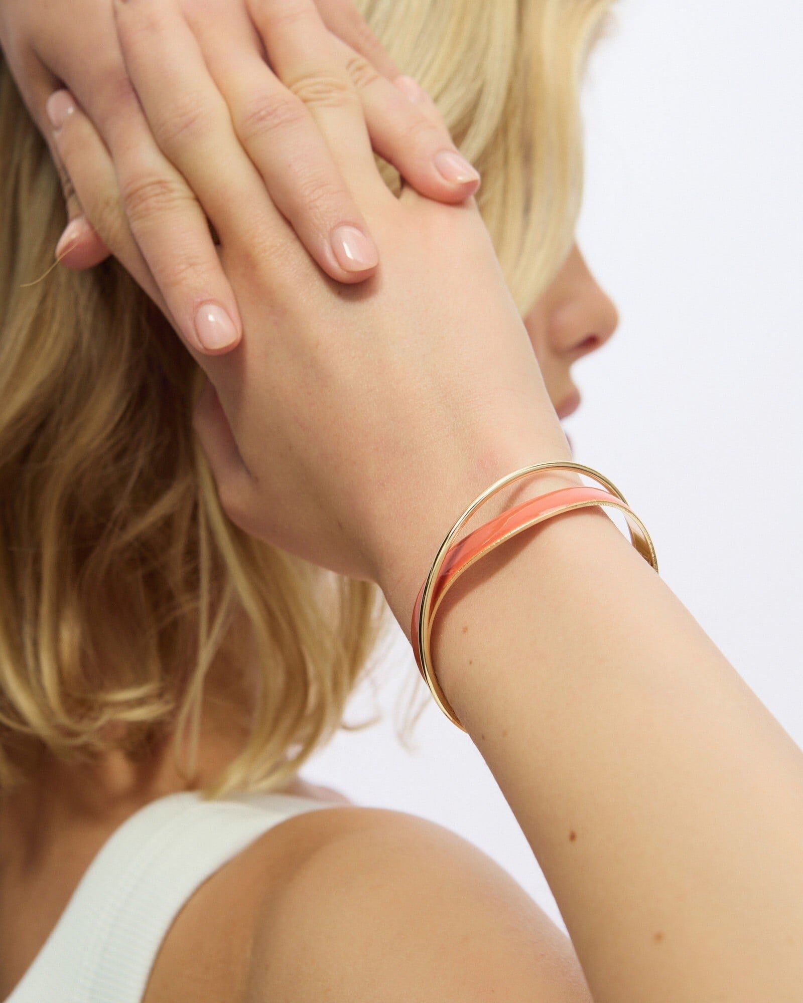 Christie Twist Orange Enamel Bangle | Oliver Bonas