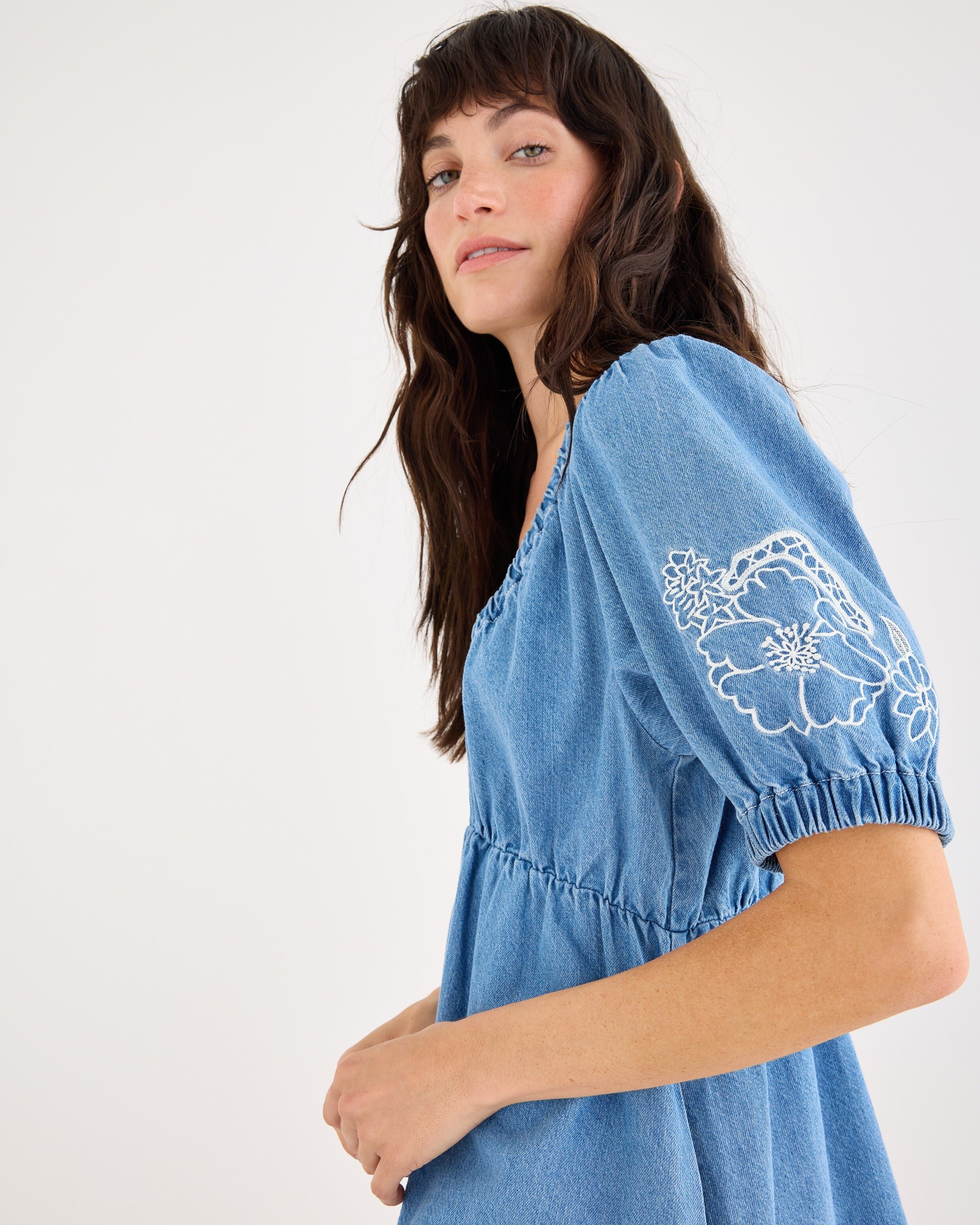 Blue Floral Embroidered V-Neck Denim Mini Dress | Oliver Bonas Blue Floral Embroidered V-Neck Denim Mini Dress | Oliver Bonas