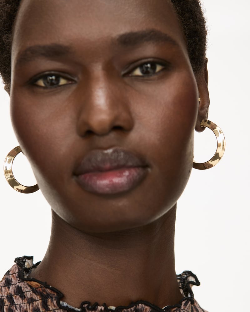 Aninah Shiny Gold Tone Medium Hoop Earrings