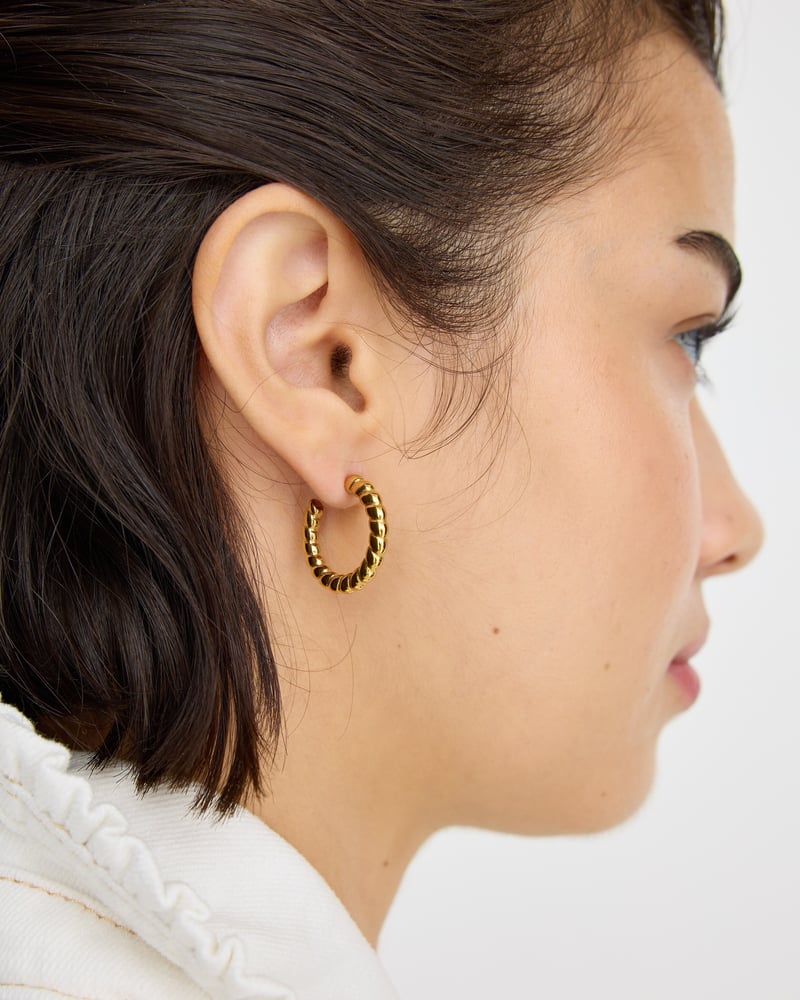 Faith Gold Tone Waterproof Curved Edge Hoop Earrings