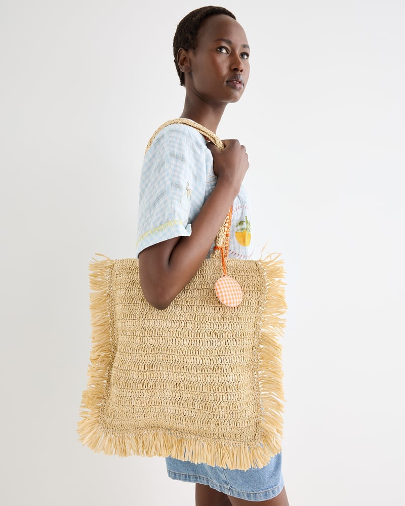 Cream Fringe Tote Bag with Orange Charm
