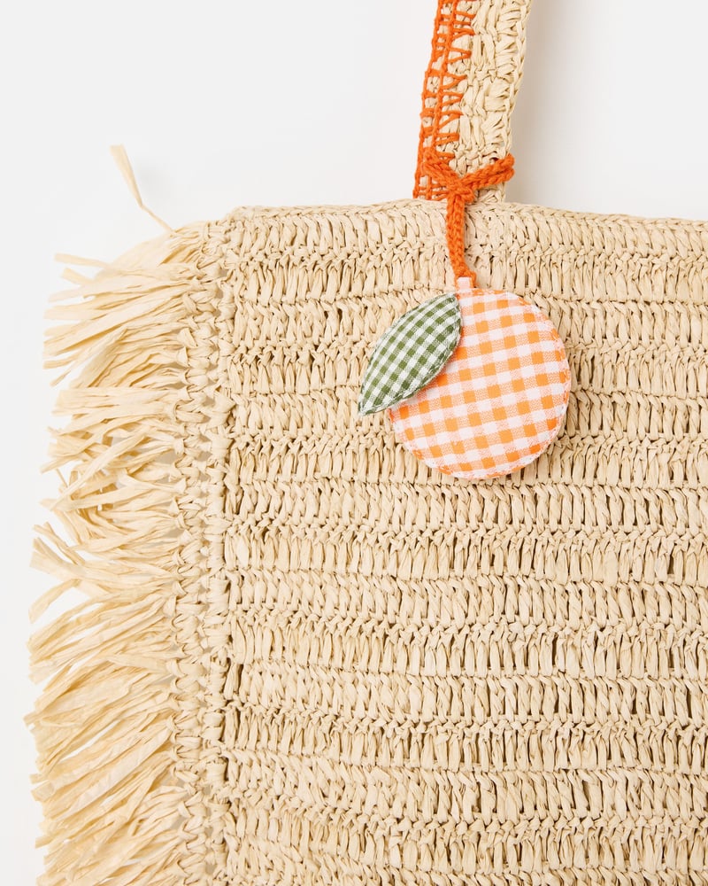 Cream Fringe Tote Bag with Orange Charm