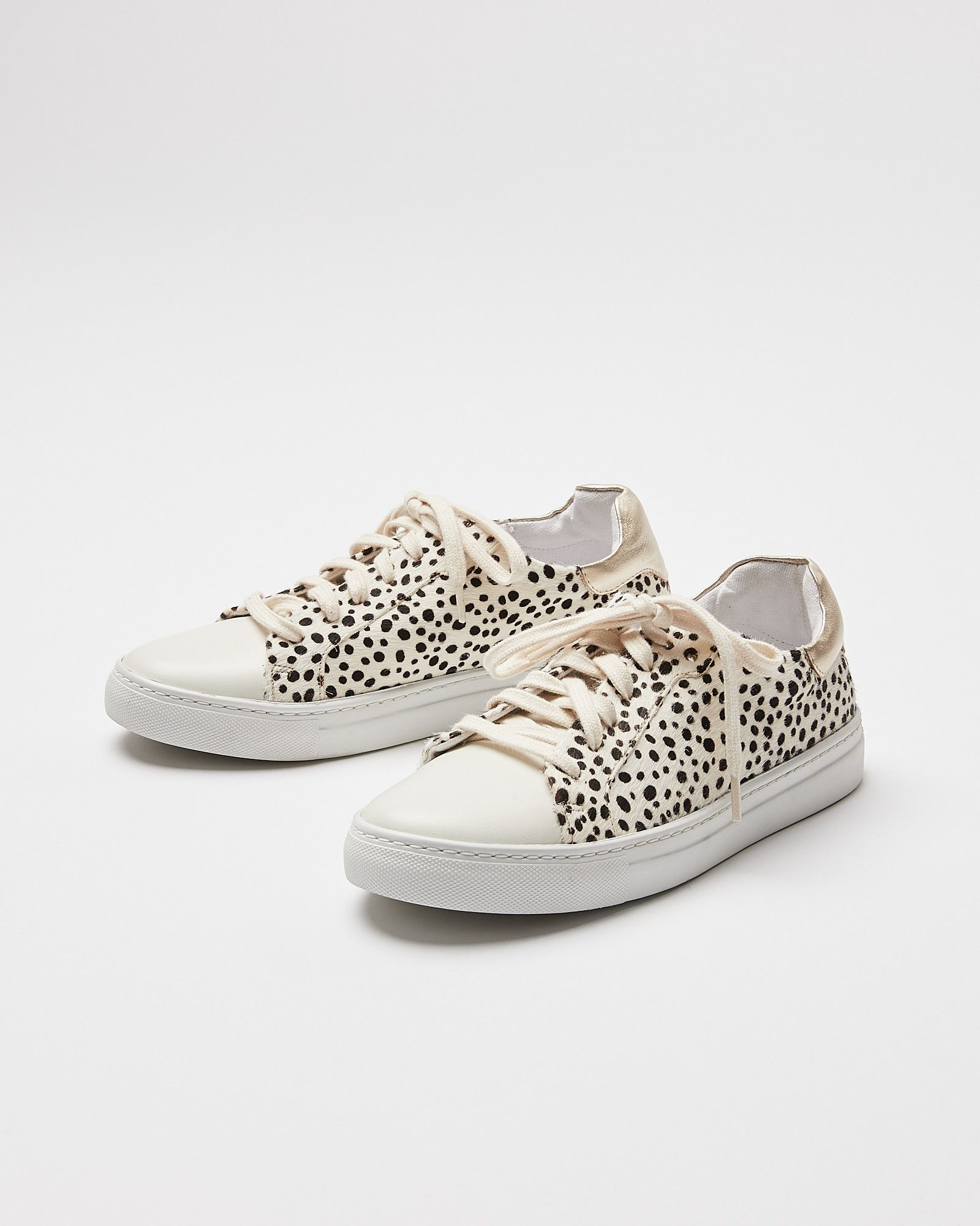 white trainers with leopard print back
