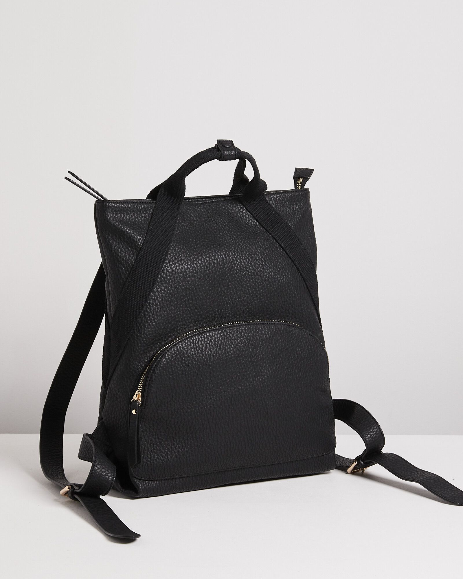 Brooke Curve Pocket & Black Faux Leather Backpack Midi | Oliver Bonas