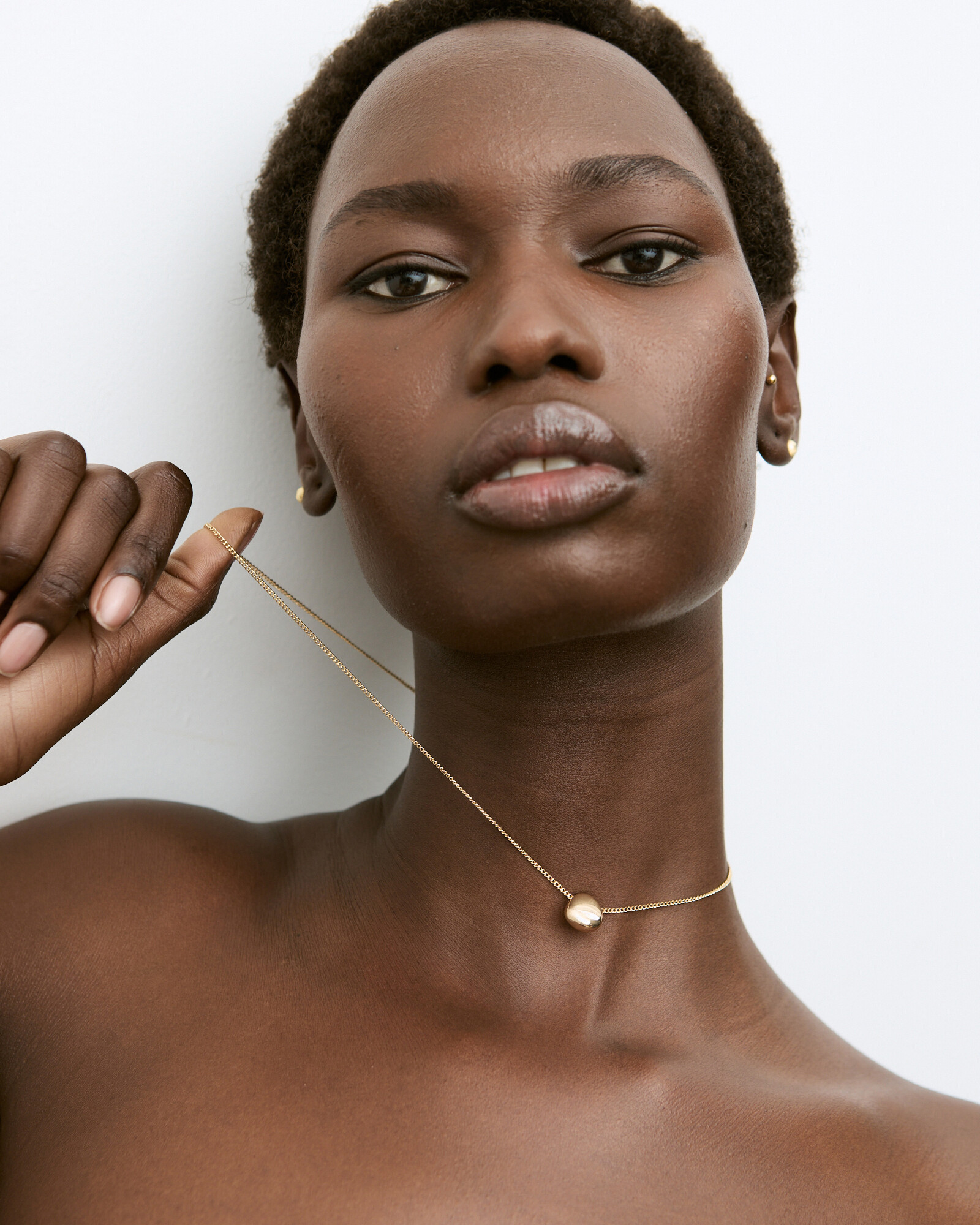 Zabel Gold Tone Pebble Pendant Necklace | Oliver Bonas