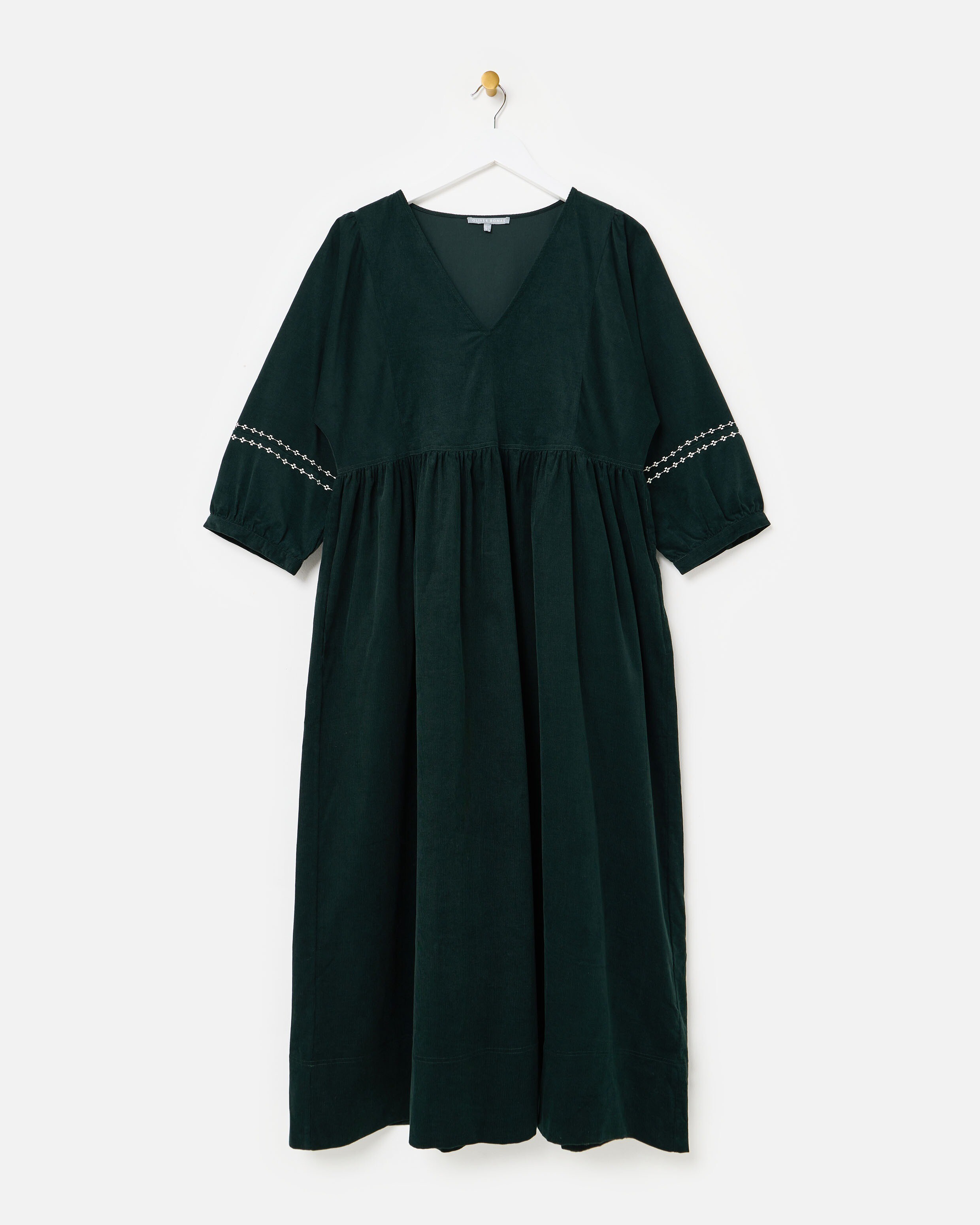 green emerald velvet dress Emerald Poise Corduroy Midi Dress – JULO main image 1