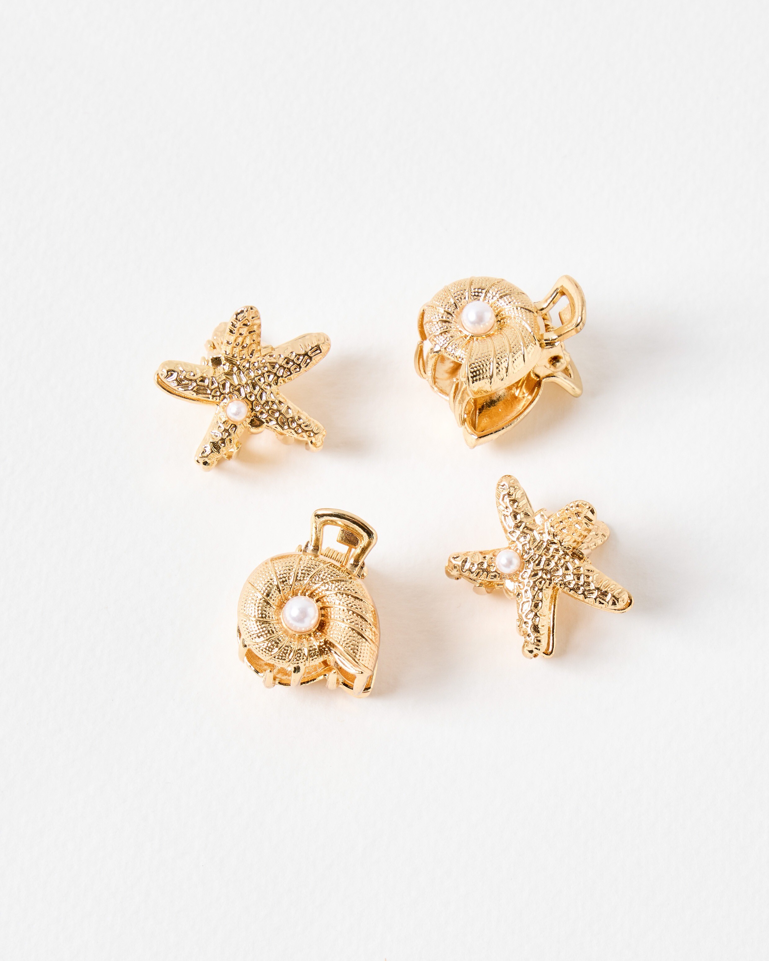 Arielle Gold Mini Shell Claw Clips Set of Four | Oliver Bonas