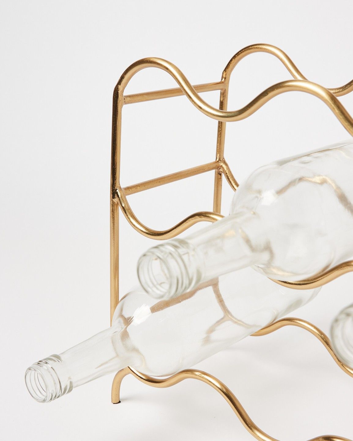 Oliver Bonas Gold Metal Freestanding Wine Rack