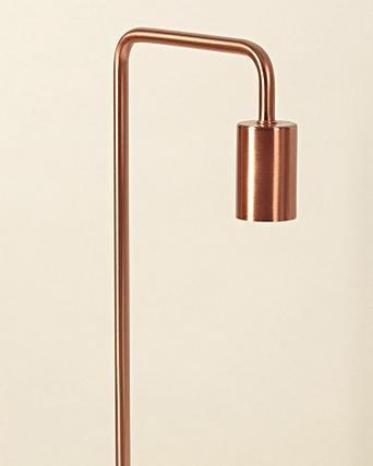 white and copper table lamp