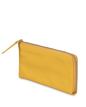 oliver bonas yellow purse