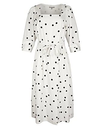 white dress with white polka dots