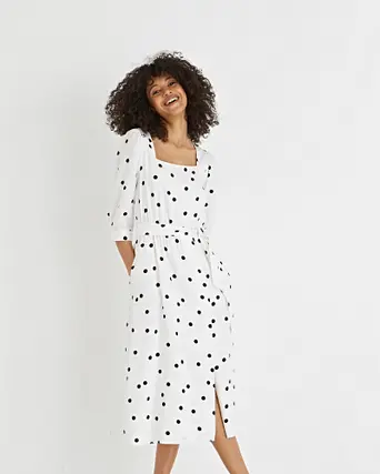 black and white midi dress with sleeves