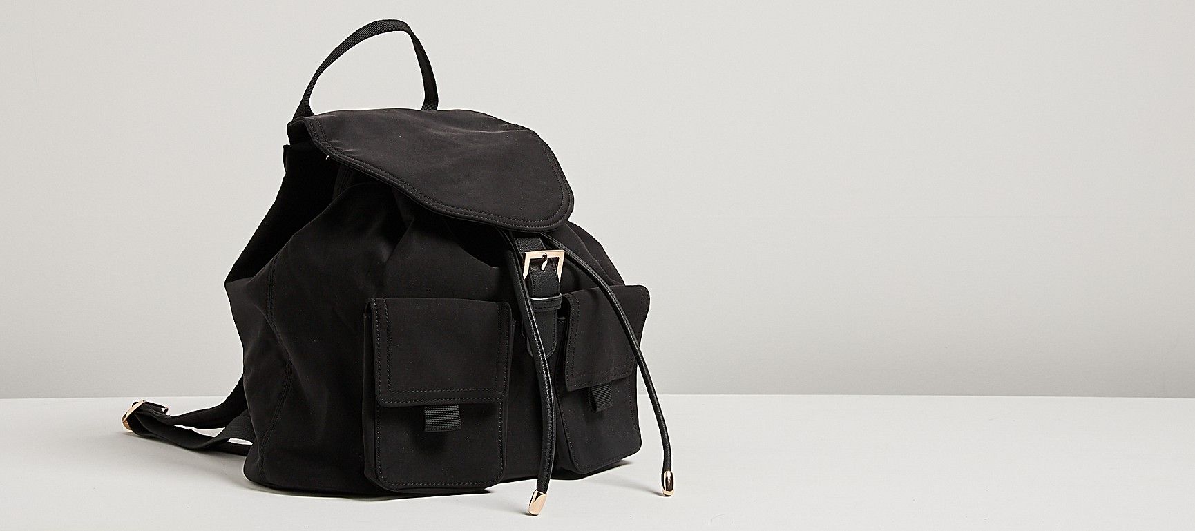 Milani Black Fabric Double Pocket Backpack | Oliver Bonas